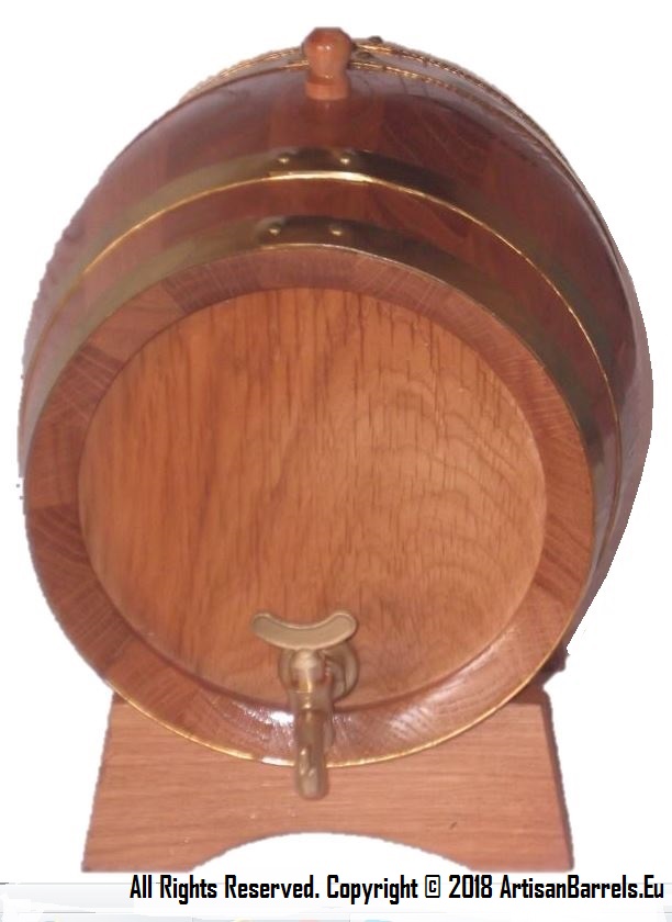 small oak barrel with brass hoops and tap